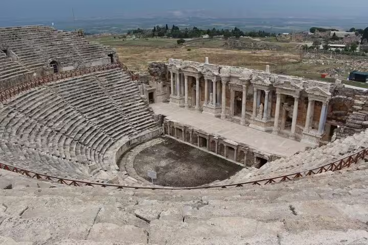 Ancient Roman amphitheater in Ephesus showcasing historical architecture on a 2-day tour from Istanbul.