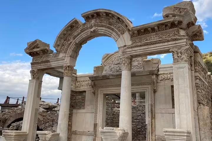 Ornate Roman arch and columns at Ephesus, Turkey, on Seven Churches of Revelation 5-day mini group guided tour