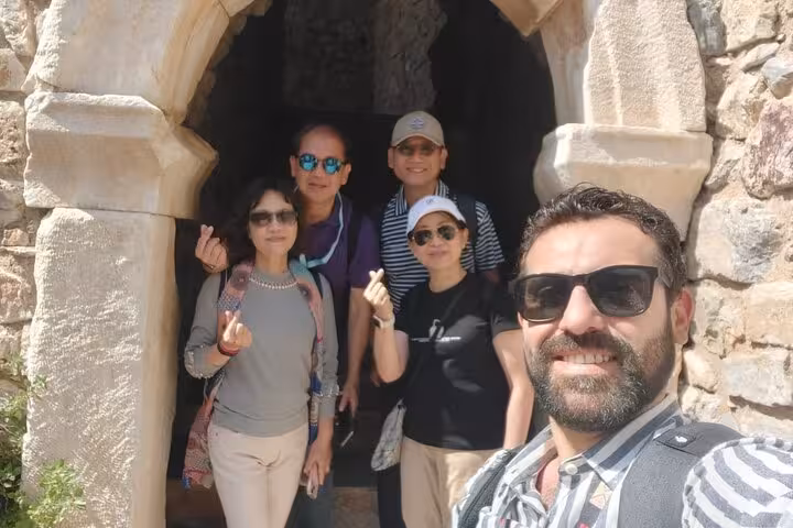Ephesus small group shore excursion selfie at ancient stone archway, skip-the-line cruise tour in Turkey