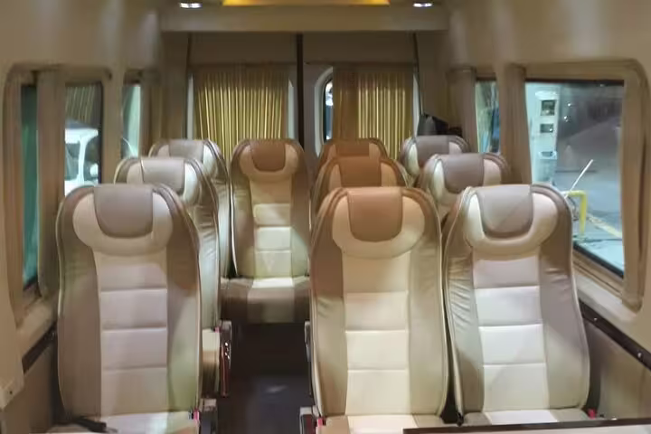 Comfortable private minibus interior for all-inclusive Ephesus and St. John Basilica tour with lunch transfer