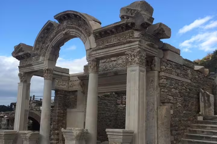 Ornate stone arch and columns at Ephesus on private St. John Basilica and House of Virgin Mary tour with lunch