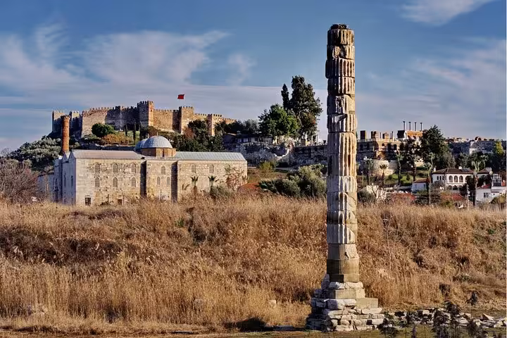 Temple of Artemis column and Selcuk castle on private Ephesus shore excursion from Kusadasi Port, Turkey