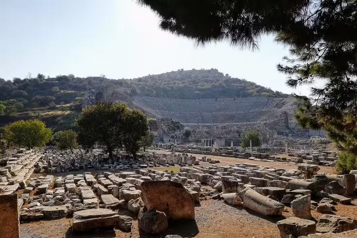 Great Theatre of Ephesus and scattered marble ruins on all-inclusive private Ephesus tour from Istanbul