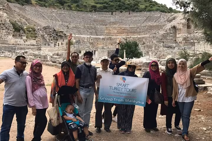Private Ephesus tour group photo at the Great Theatre near Kusadasi Port, guided shore excursion