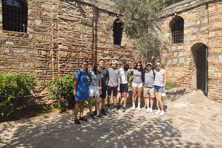 Tour group at House of Virgin Mary near Ephesus on Istanbul to Izmir flight day tour with local guide