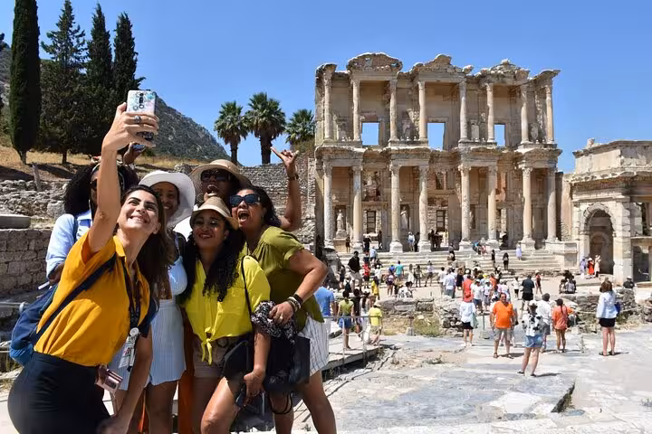 Cruise guests take a selfie by the Library of Celsus on skip-the-line Ephesus tour from Kusadasi Port