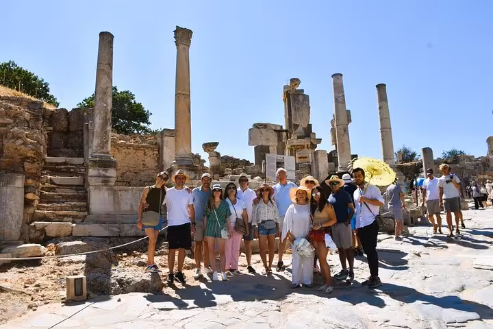 Group shore excursion at Ephesus from Kusadasi Cruise Port, walking among Roman columns on skip-the-line tour