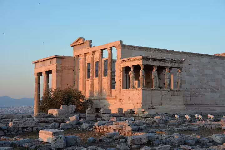 Erechtheion with Caryatids at sunset on the Acropolis of Athens, featured on Viator Exclusive tour with dinner