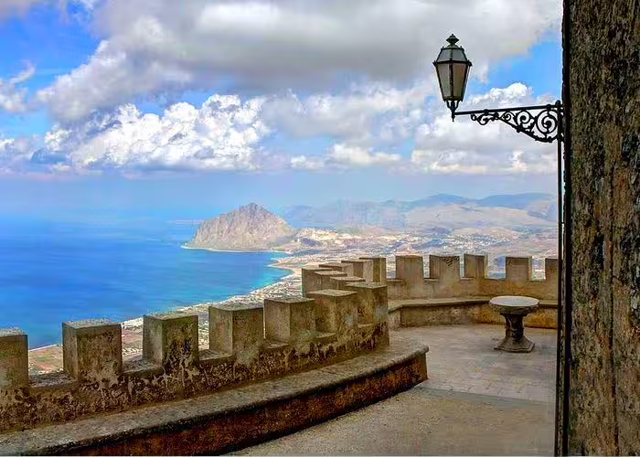 Panoramic view from Erice’s medieval terrace over the Tyrrhenian Sea and Monte Cofano on a private tour from Palermo