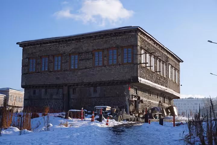 Historic Erzurum stone mansion in winter, stop on an all-inclusive private guided walking tour