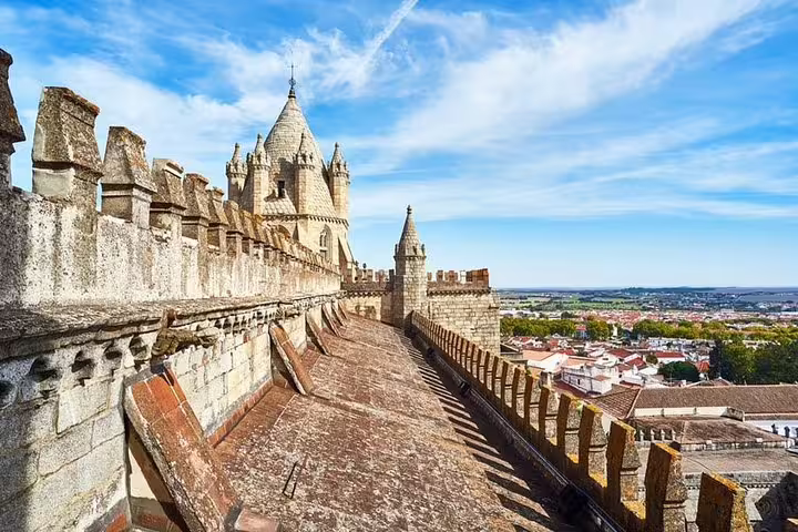 Evora private tour from Lisbon showcasing the historic Cathedral of Évora with panoramic views of the charming cityscape.