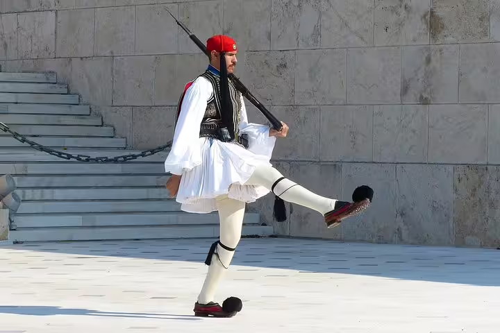 Evzones guard performing ceremonial march in Athens on a private Classical Athens sightseeing tour