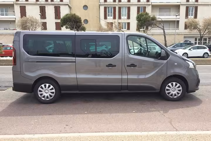 Side view of executive van for private Marseille to Lyon transfer, spacious ride for families and groups