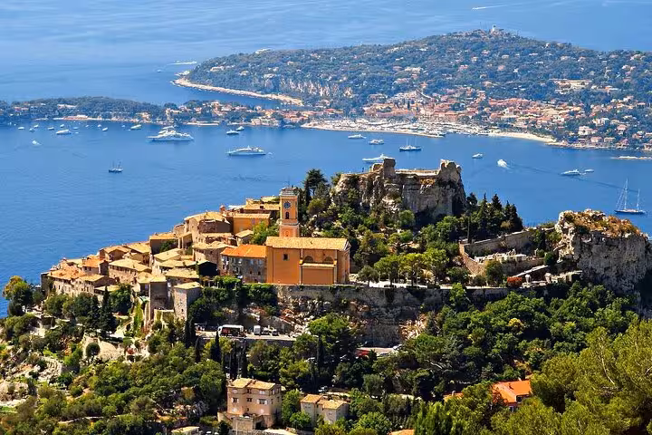 Aerial view of Eze medieval village perched on hilltop overlooking the French Riviera and Mediterranean Sea