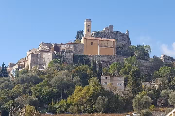 Hilltop village of Eze with stone houses and church, scenic stop on a private Marseille shore excursion to Monaco