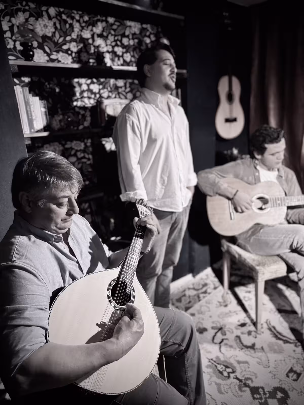 Intimate Fado performance with musicians playing traditional Portuguese guitars, capturing the soulful essence of Lisbon.