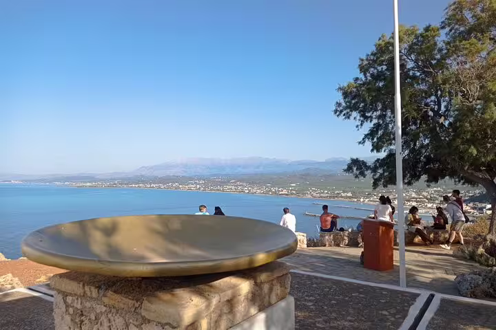 Breathtaking view from Thousand Flowers Falasarna Beach, overlooking blue seas and distant mountains, perfect for relaxation.