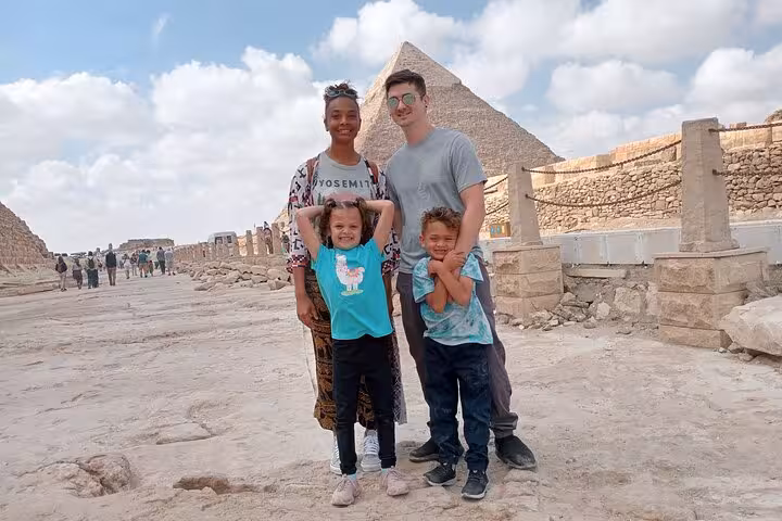 Family photo on Giza Plateau with Great Pyramid backdrop, Cairo and Giza private tour with kids-friendly stop