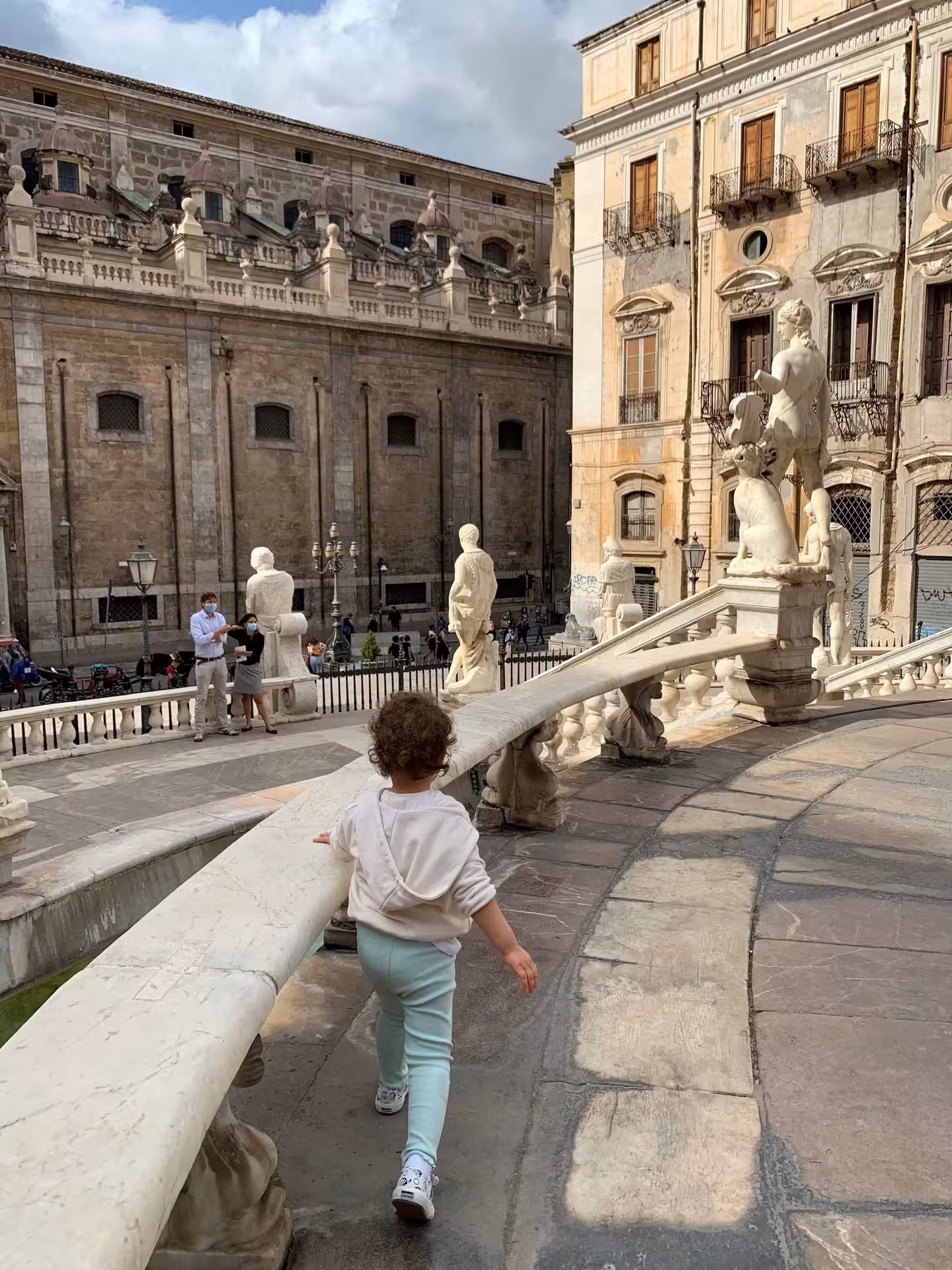 Family exploring Piazza Pretoria fountain in Palermo on Monreale, Monte Pellegrino and Mondello full day tour