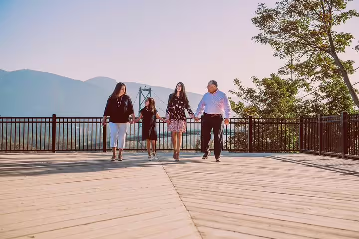 Family walking on Vancouver scenic viewpoint boardwalk, captured on a personal travel photographer tour