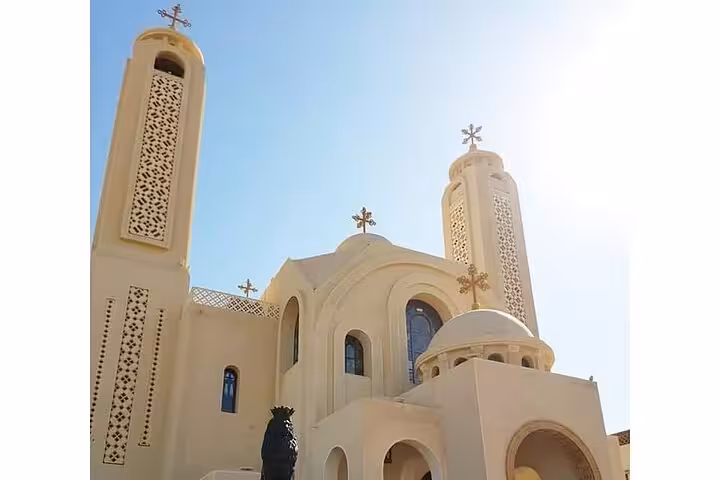 Sunlit Coptic church exterior in Sharm El Sheikh, a stop on Farsha Cafe and guided city sightseeing tour
