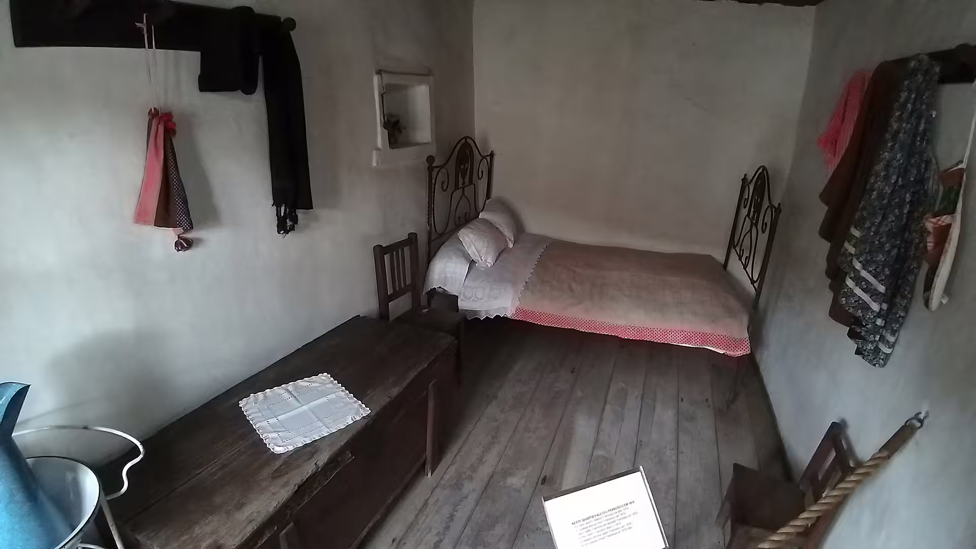 Cozy interior of a Little Shepherds' house with rustic furnishings, featured in the Fátima Sanctuary private tour.