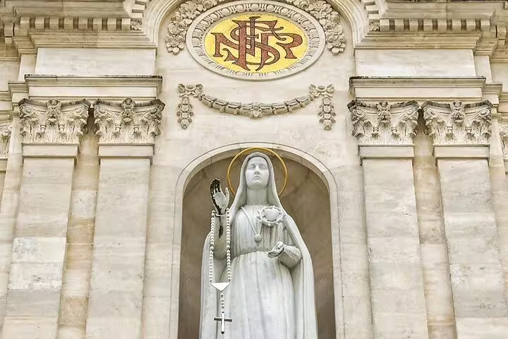 Statue of Our Lady of Fátima at the Sanctuary, featured in the Fátima day trip from Lisbon, ideal for small group tours.