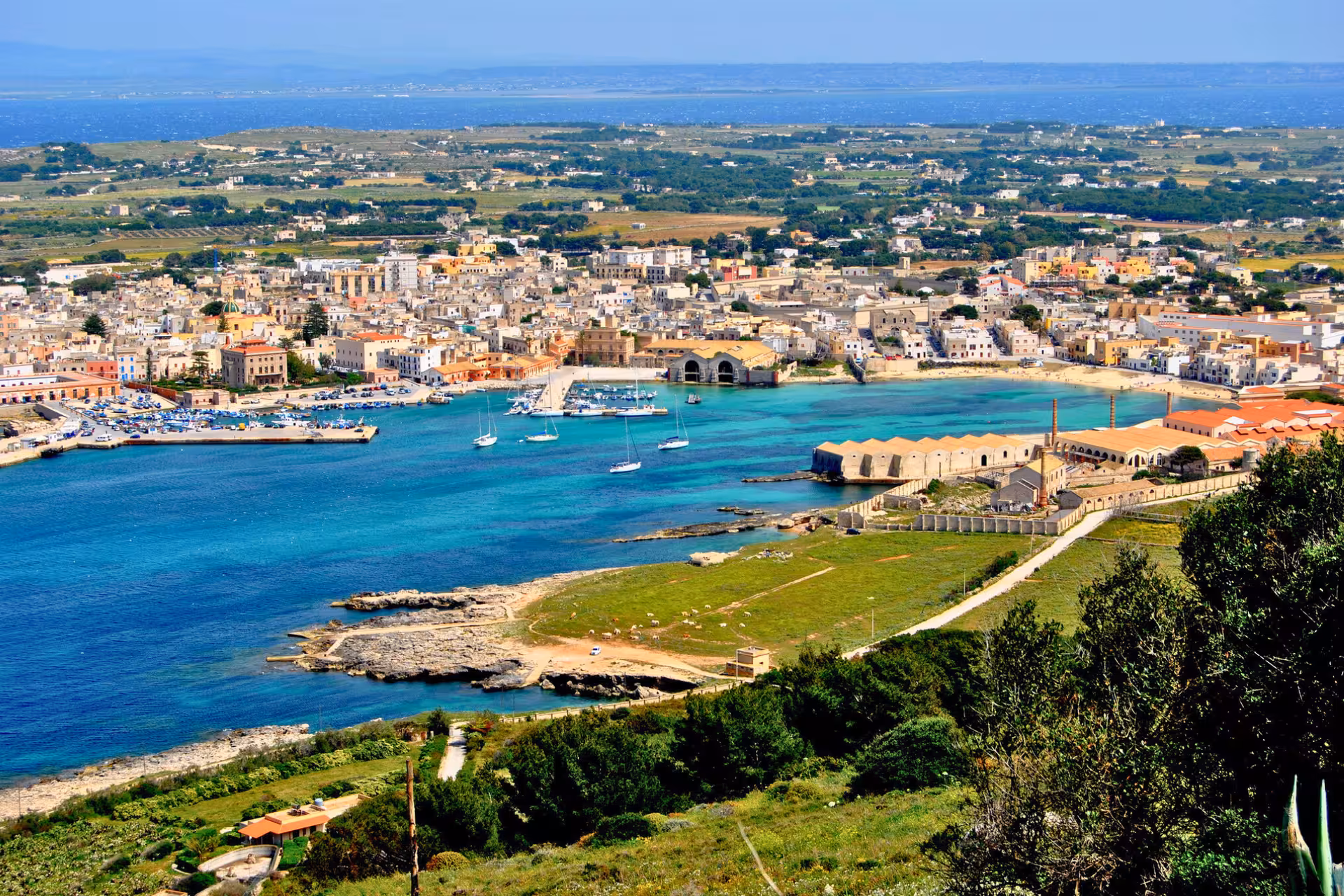 Aerial view of Favignana harbor and town, Egadi Islands day trip by boat from Trapani with lunch included