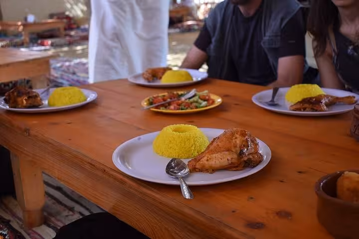 Traditional Fayoum Oasis lunch with grilled chicken and rice on Cairo Fayoum tour after pottery art and desert safari
