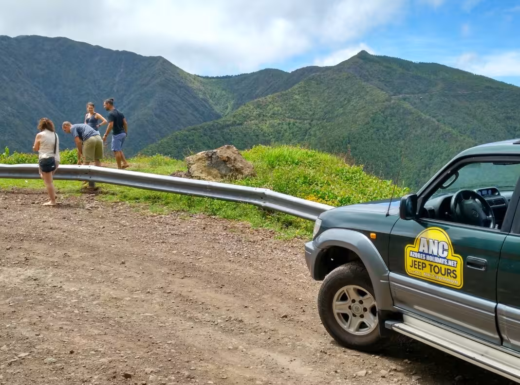 Jeep viewpoint stop on FD JEEP Povoacao e Nordeste tour, São Miguel Azores, with lush green mountains