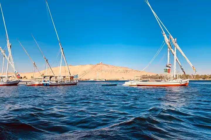 Felucca sailboats on the Nile River near Luxor, scenic view on a 4 nights 5 days Nile cruise from Luxor