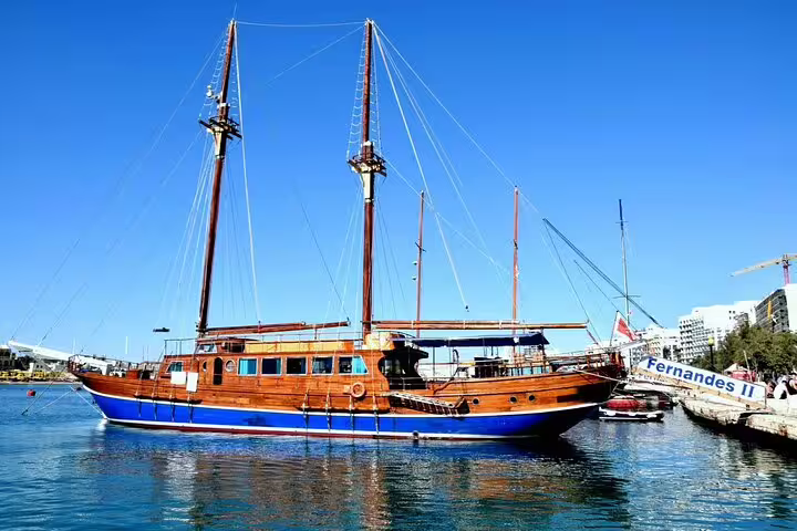 Fernandes II classic wooden sailing vessel docked at Malta harbor ready for a full-day Gozo and Comino boat tour