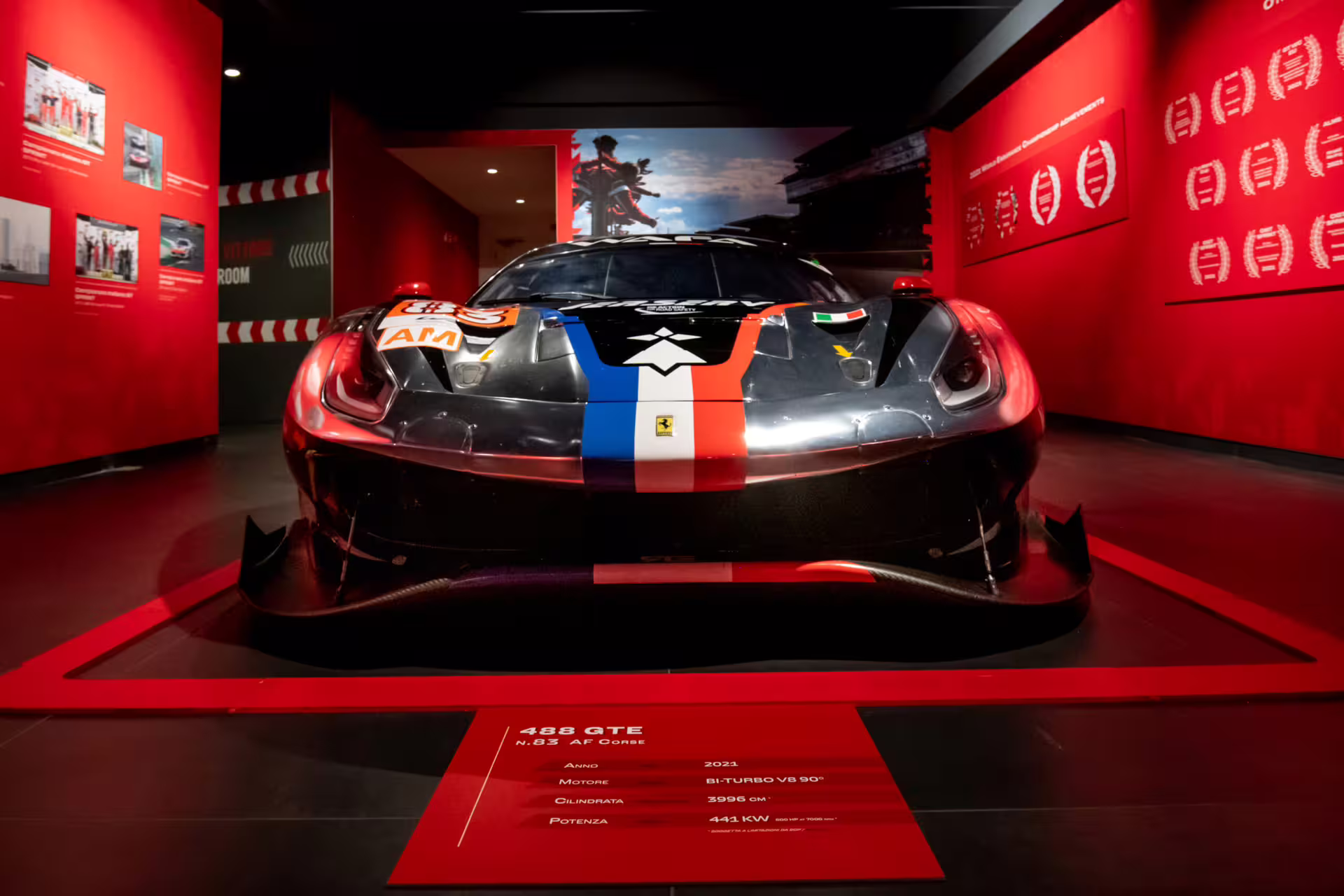 Ferrari 488 GTE race car on display at Ferrari Museum Maranello, part of Fiorano track shuttle tour