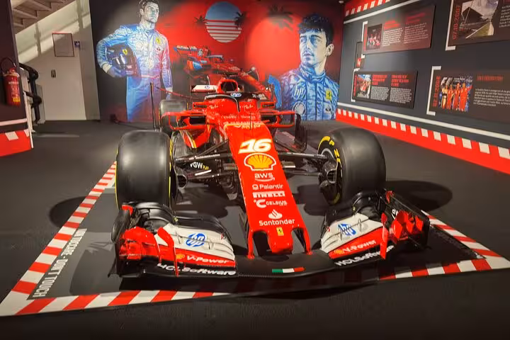 Explore Ferrari Museum with iconic red Formula 1 car, part of the Parmesan and Balsamic tour experience.