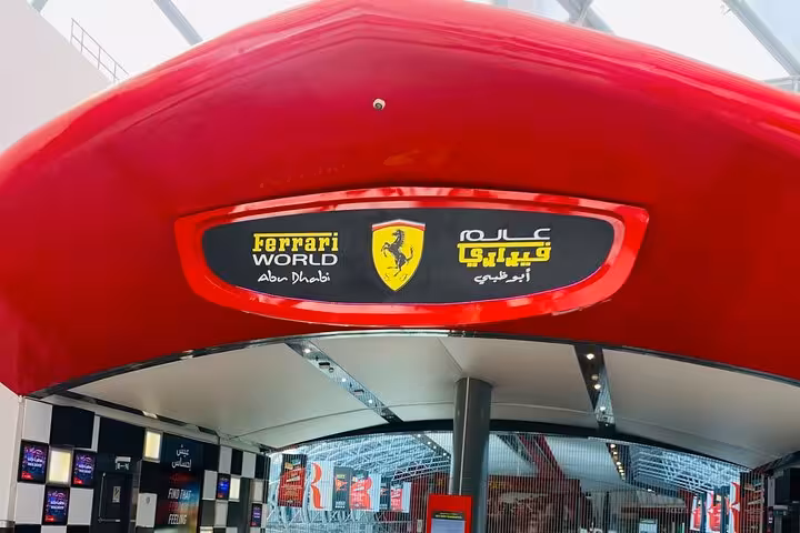 Ferrari World Abu Dhabi entrance sign at Yas Island, photo stop on Abu Dhabi city tour from Ras Al Khaimah