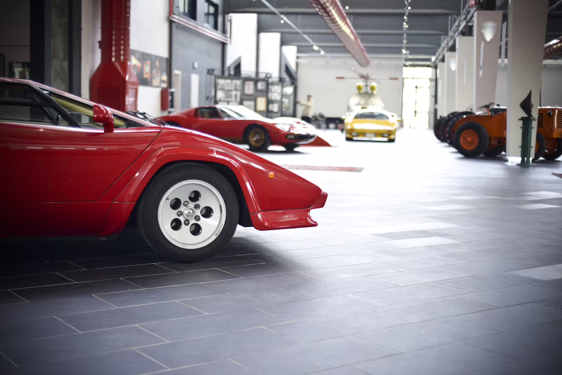 Ferruccio Lamborghini Museum gallery near Bologna showcasing vintage cars and tractors with entry ticket