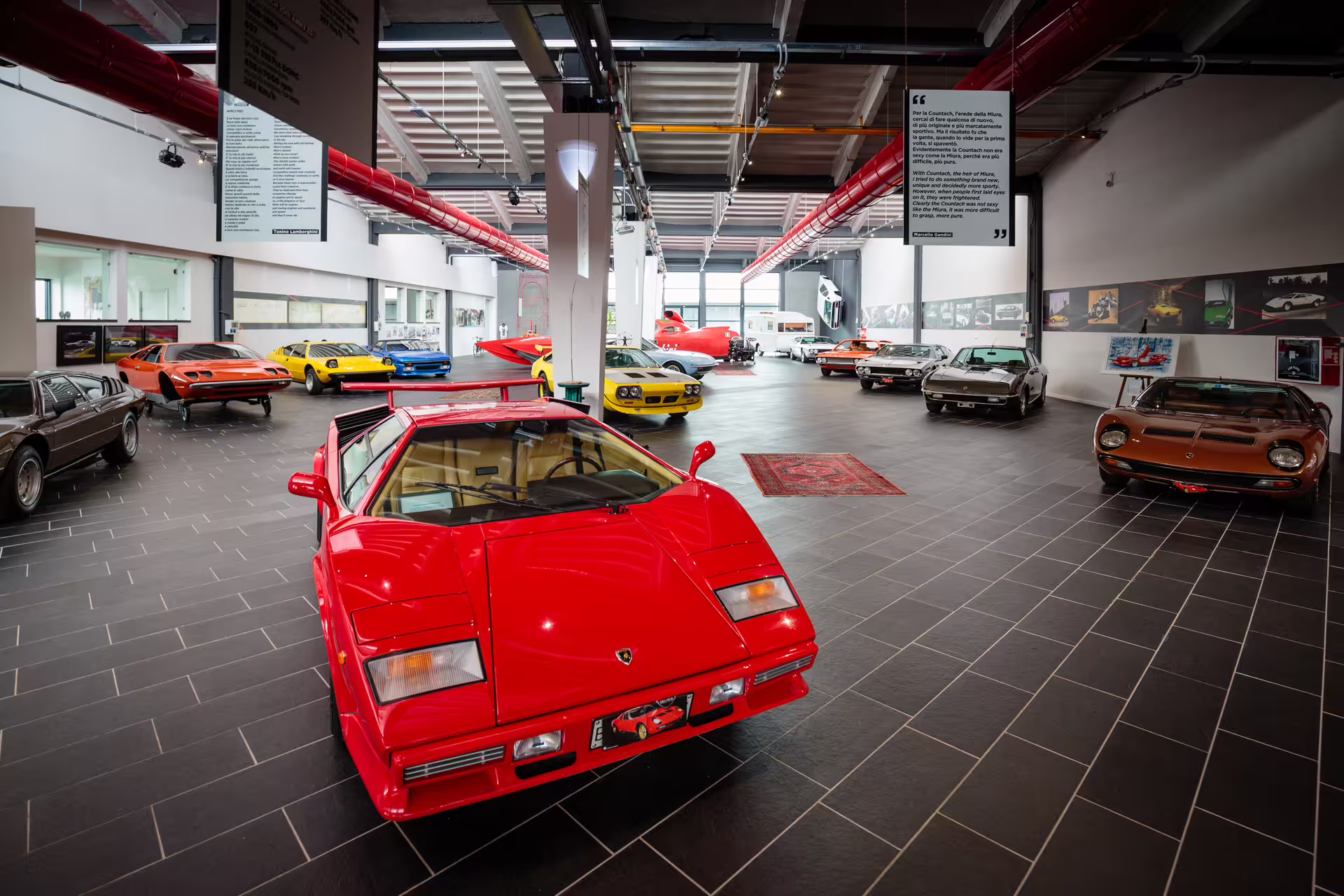 Classic Lamborghini cars displayed inside the Ferruccio Lamborghini Museum near Bologna with entry ticket access