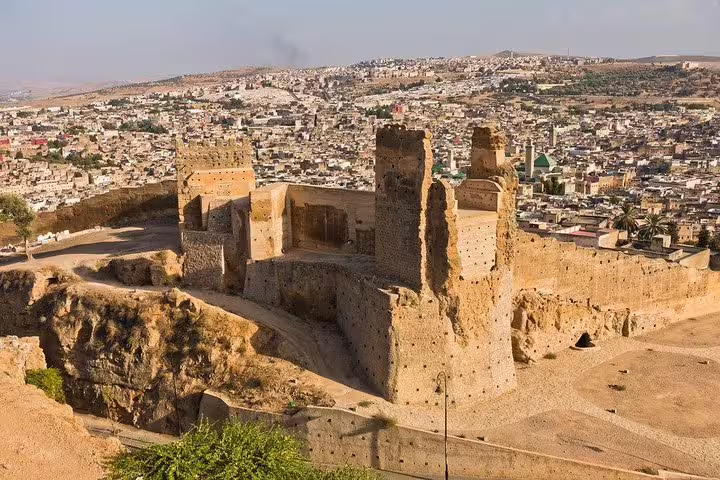 Panoramic view of Fes fortress and old medina, cultural stop on 8 day desert tour from Marrakech