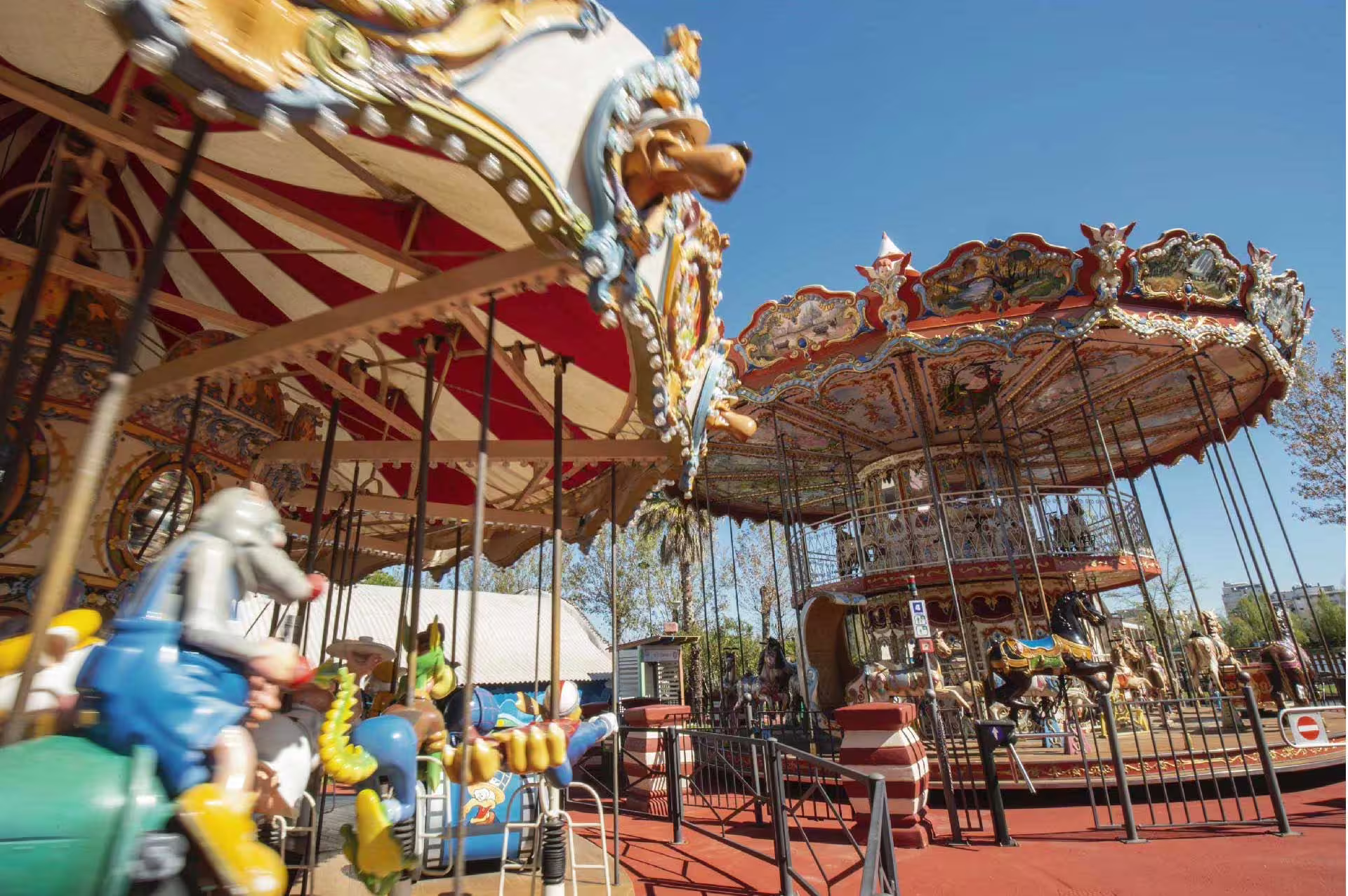 Vintage carousel ride at Fiabilandia amusement park in Rimini, Italy, included with entrance ticket