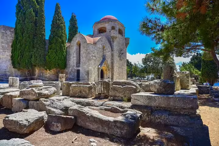 Filerimos Monastery ruins and cypress trees on Rhodes private car Limni day trip, cultural sightseeing stop