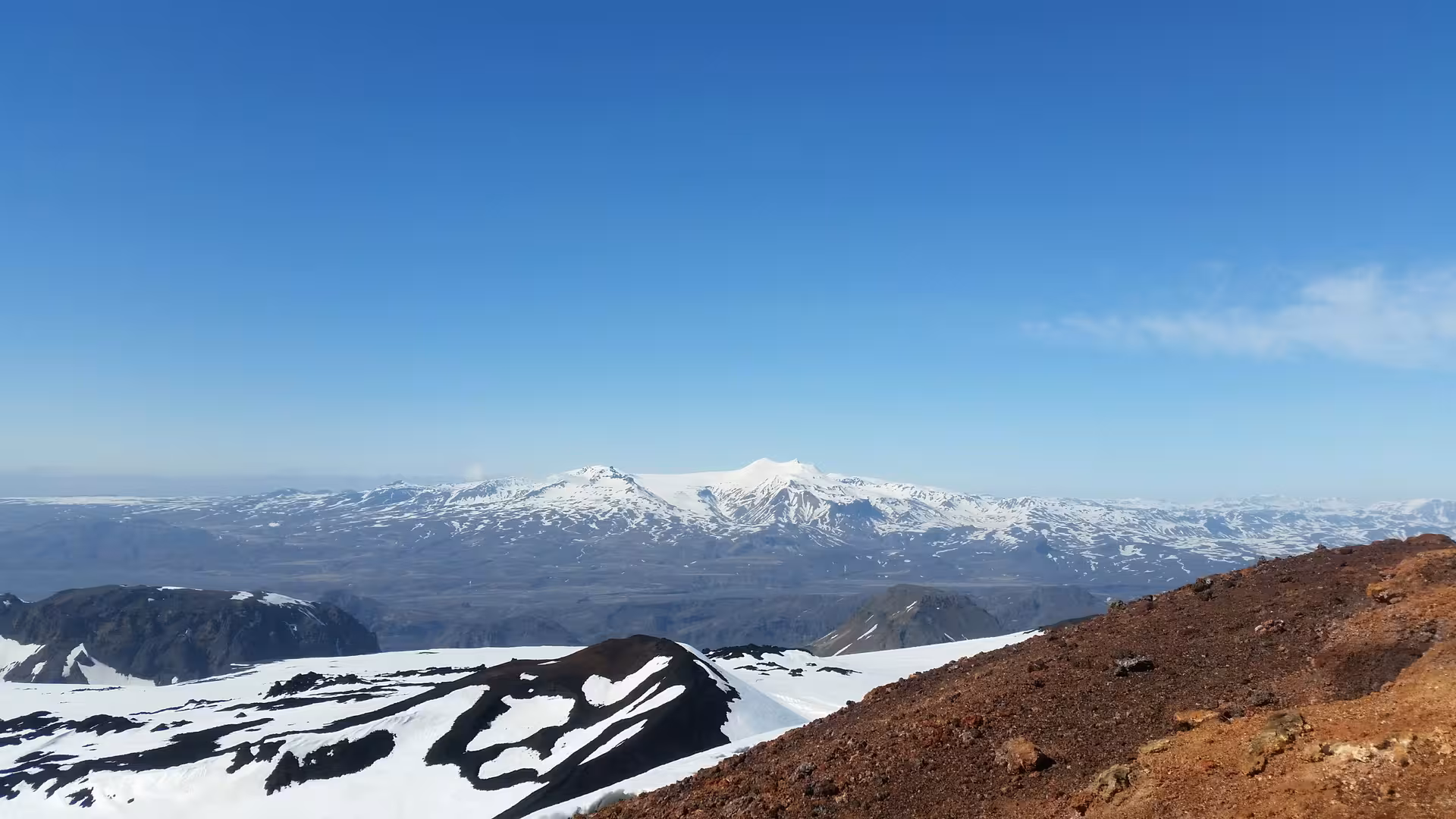 Snow-capped volcanic mountains and glacier views from Fimmvorduhals hiking trail in Iceland