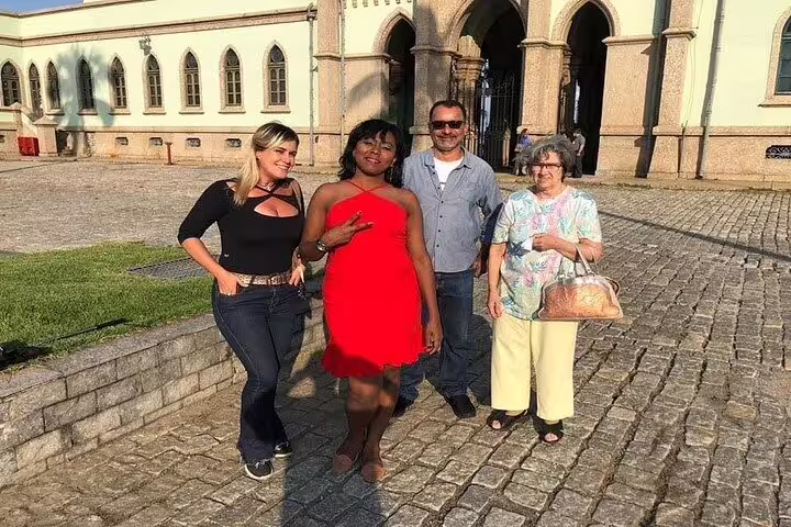 Tourists enjoying a sunny day at the historic Fiscal Island during the Brazil Imperial Rio tour.