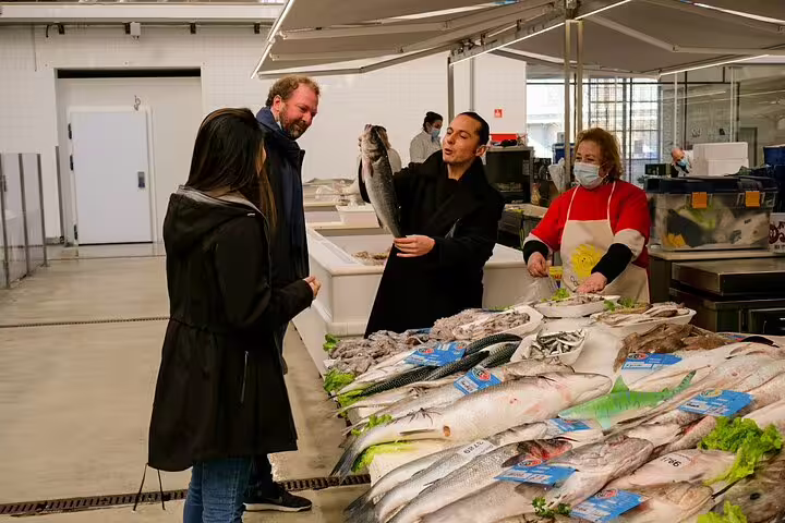 Visitors explore fresh seafood selections during the Only Fish Market Tasting Tour, guided by experts from sea to table.