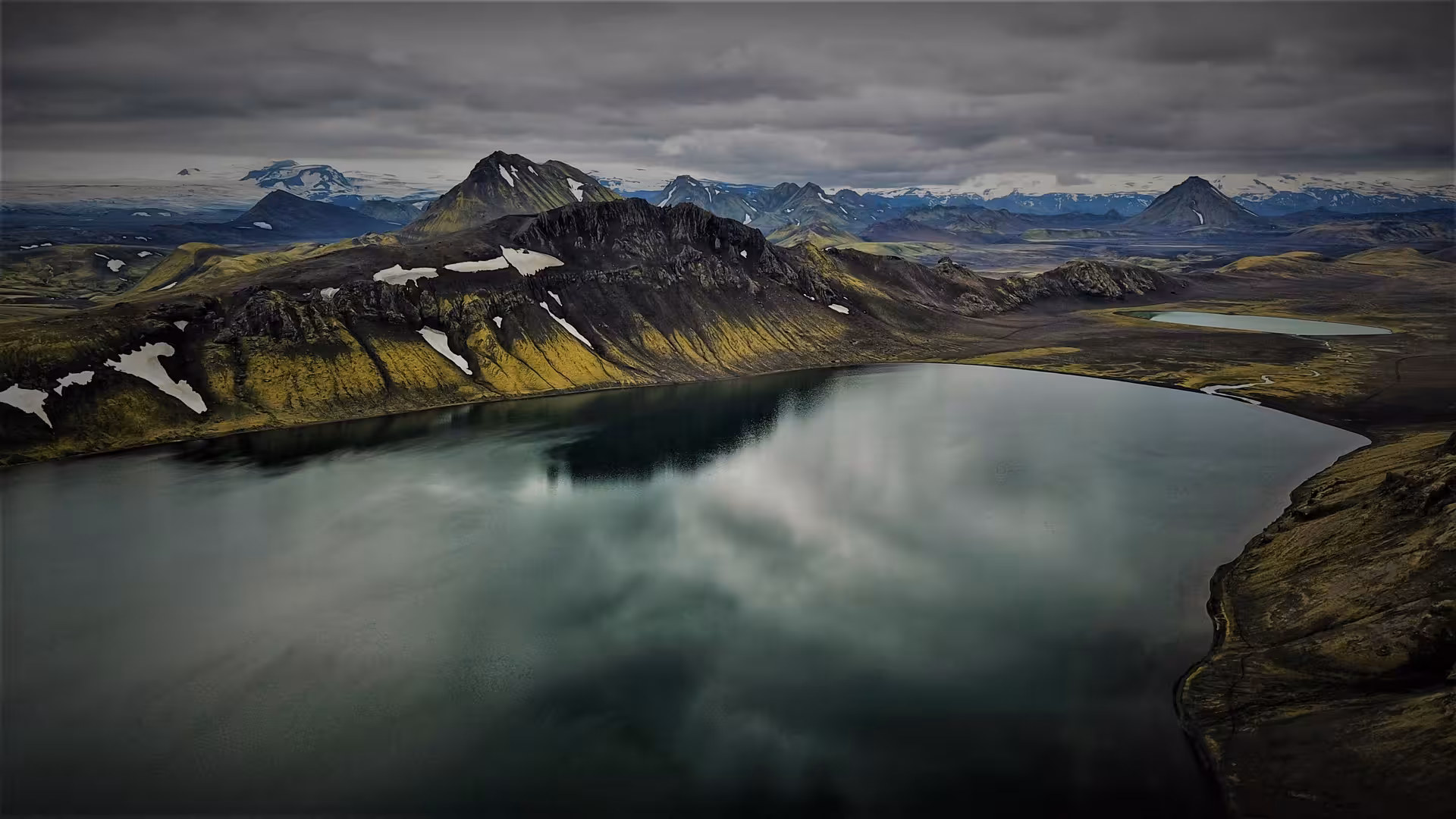 Aerial view of Mælifell volcano and glacial lake in Fjallabak Highland Iceland
