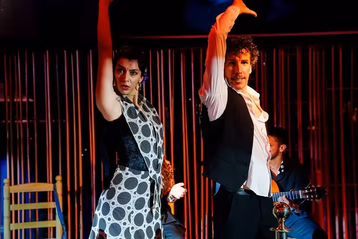 Passionate Flamenco dancers perform with intensity and flair at a live show in vibrant Barcelona.