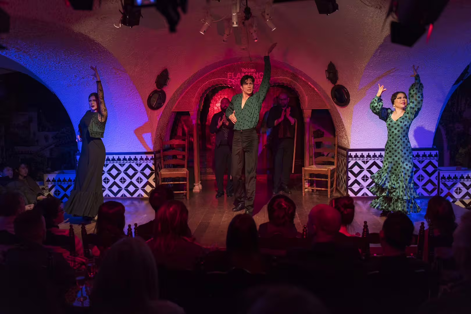 Energetic flamenco performance with skilled dancers on stage at Tablao Cordobes, La Rambla, Barcelona.