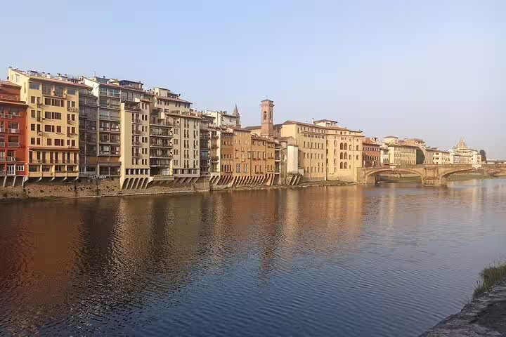 Colorful riverside buildings along the Arno River in Florence, Italy, visited on La Spezia and Carrara day trip