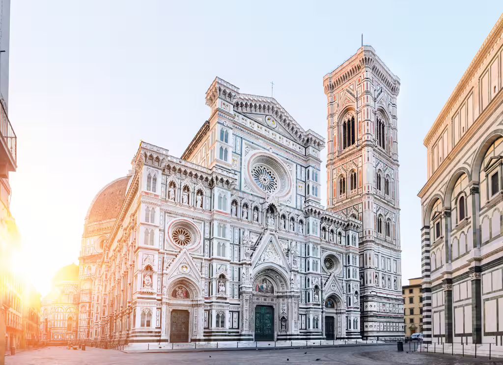 Experience the grandeur of Florence's Duomo with its intricate facade on a sunny full-day tour from Rome.