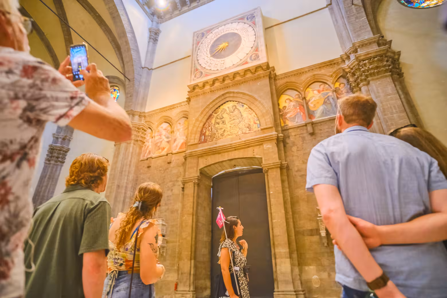 Stunning Gothic architecture and stained glass windows inside the Florence Duomo, showcasing its majestic interior.