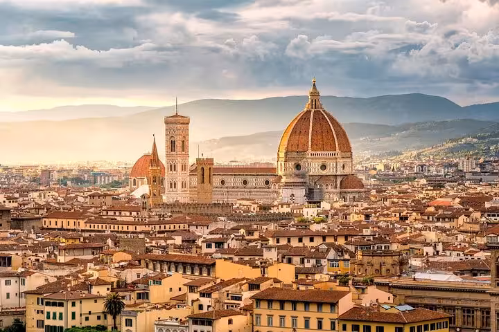 Marvel at Florence's iconic Duomo with its stunning Renaissance architecture, a highlight of the Rome to Florence journey.